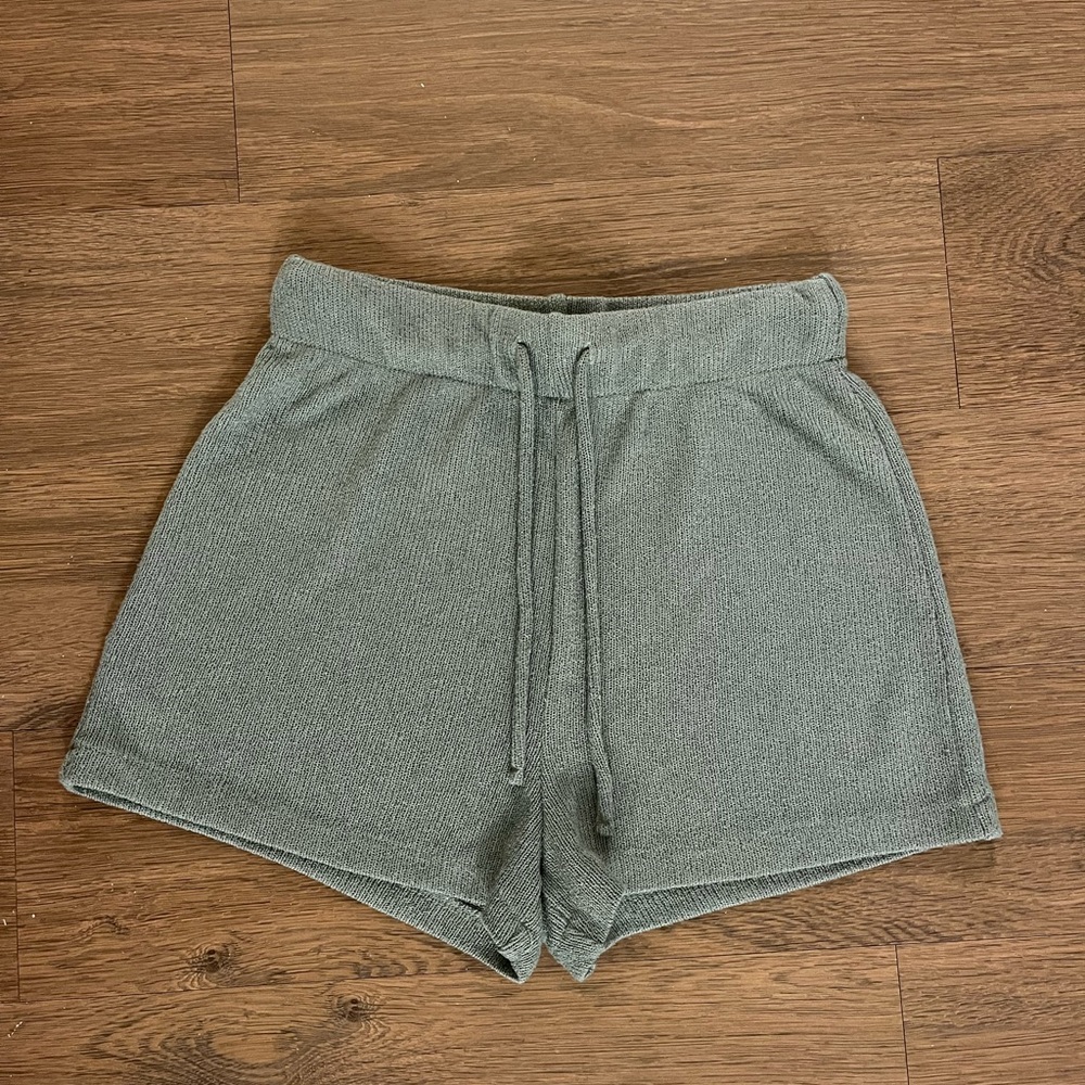 Knit mossy green shorts